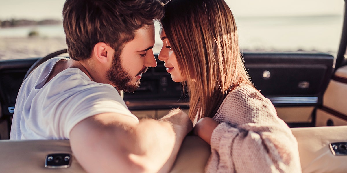 couple embracing and touching foreheads