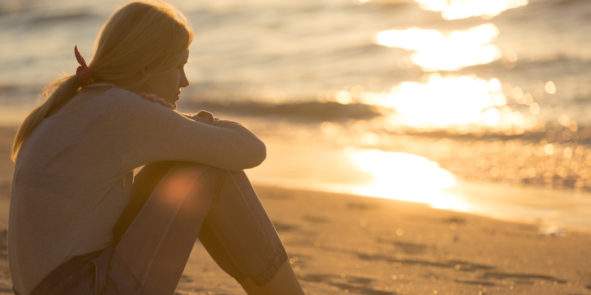 woman alone on beach