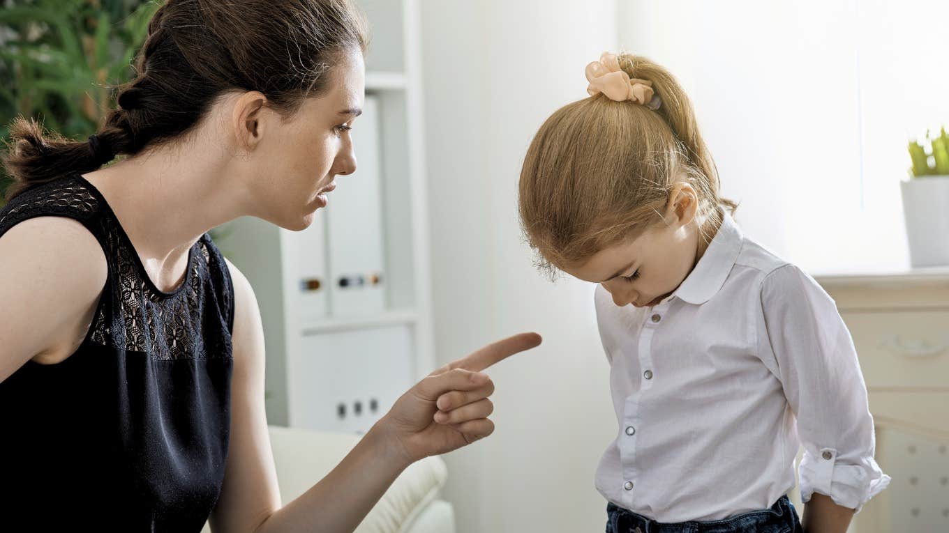 mom yelling at kid pointing finger