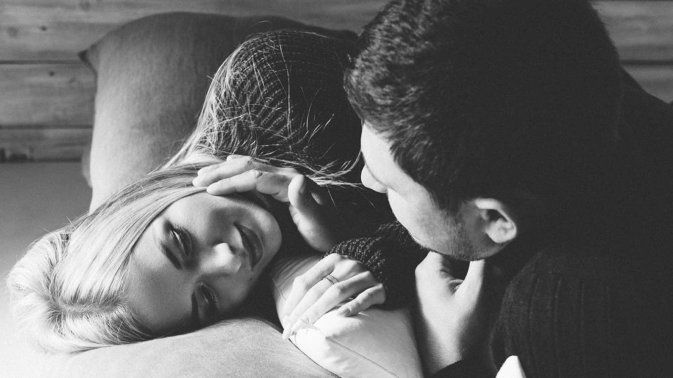 6 Harsh Reasons The Intimacy Is Gone From Your Relationship couple cuddling in bed
