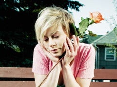 sad woman with rose