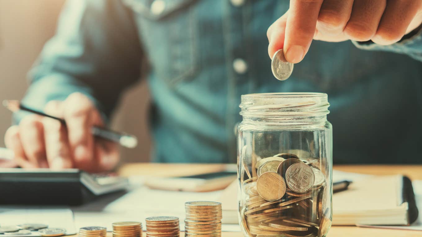 person counting and sorting money