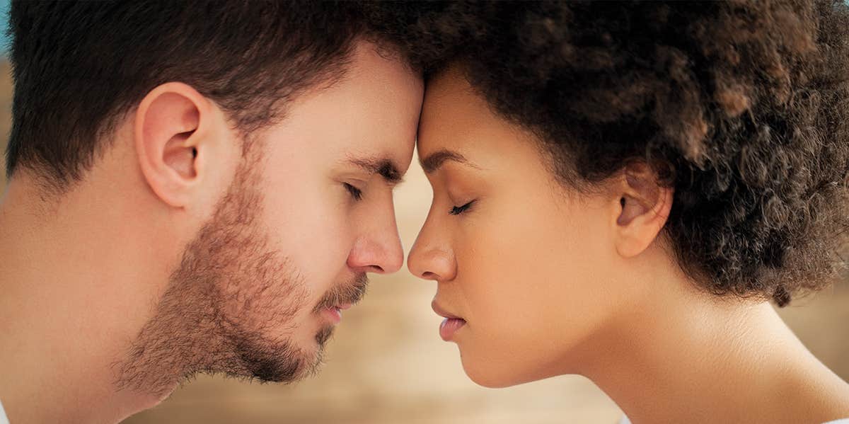3 Immediate Steps To Take If You've Drifted From Your Partner man and woman touching noses in an intimate way