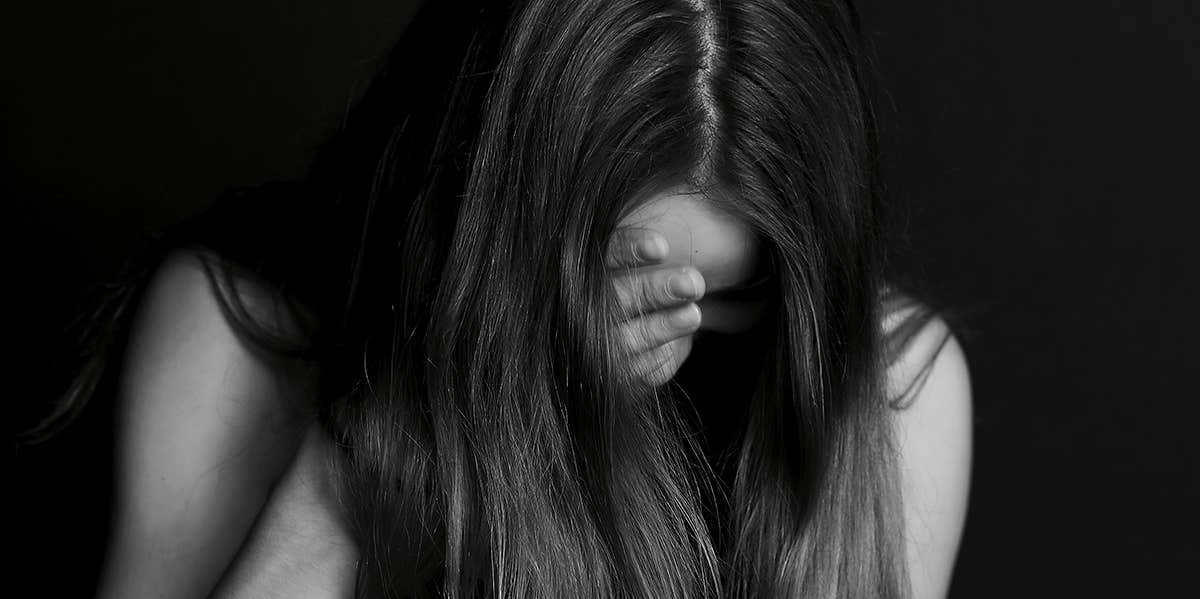 Just Saying 'No' To Sexual Harassment Never Worked For Me upset woman covering face