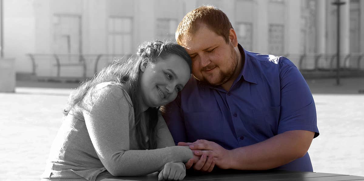 Science Says I’m Attractive to Women, But I Don’t Believe It chubby wife and husband hugging