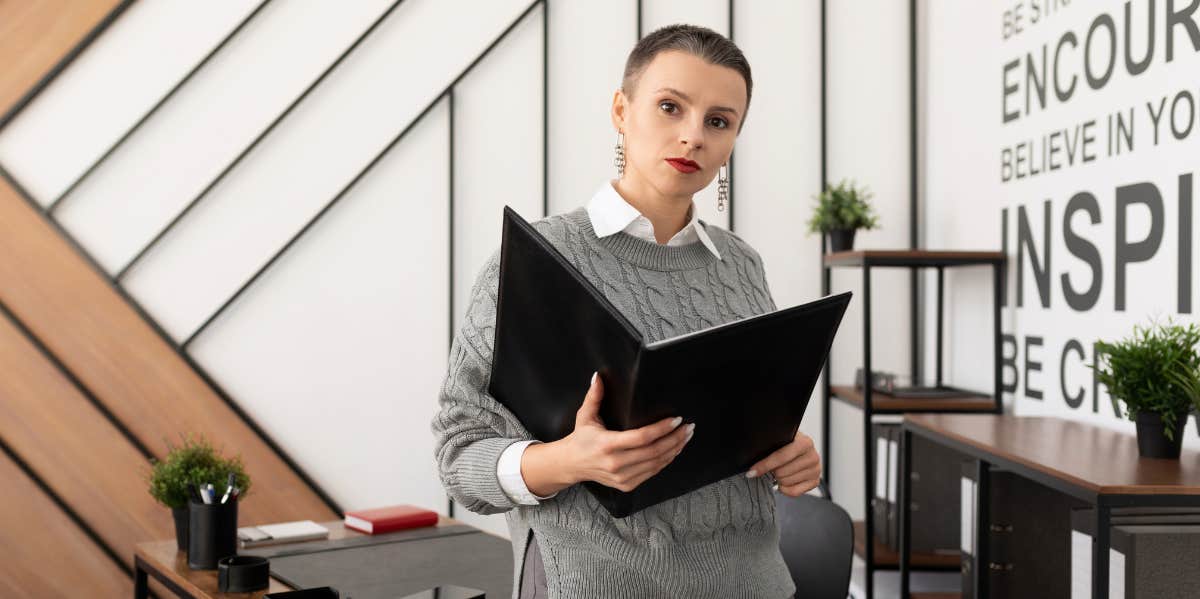 There's A 20% Chance Your Boss Is A Legit Psychopath — How To Tell For Sure professional person sitting on desk