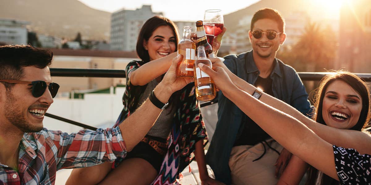 friends drinking and cheersing