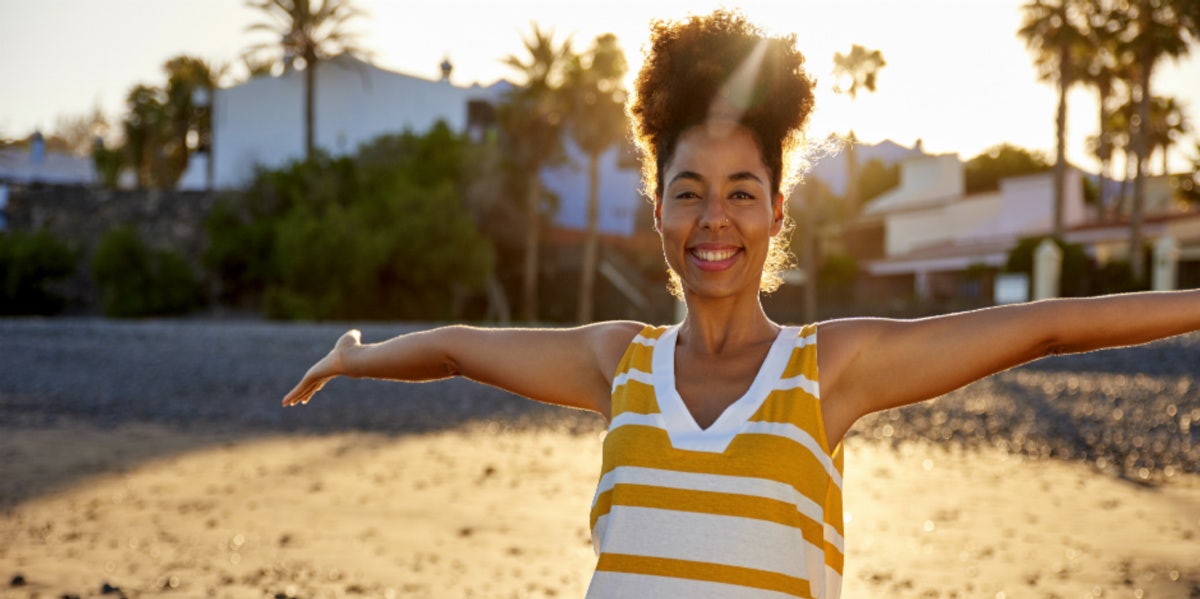 woman happy on the beach