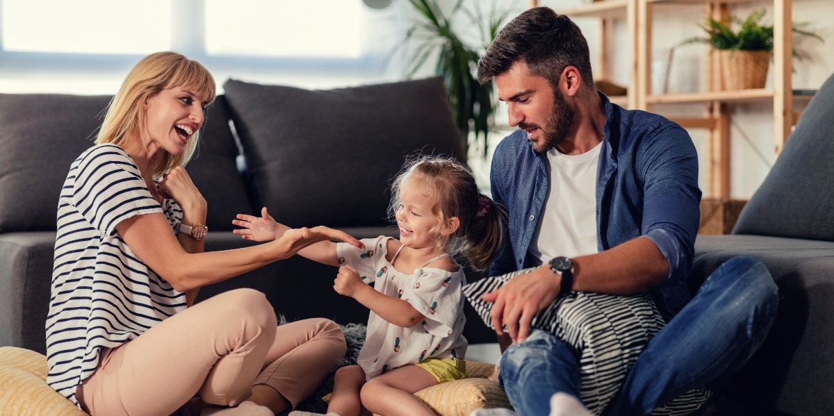 family with daughter at home