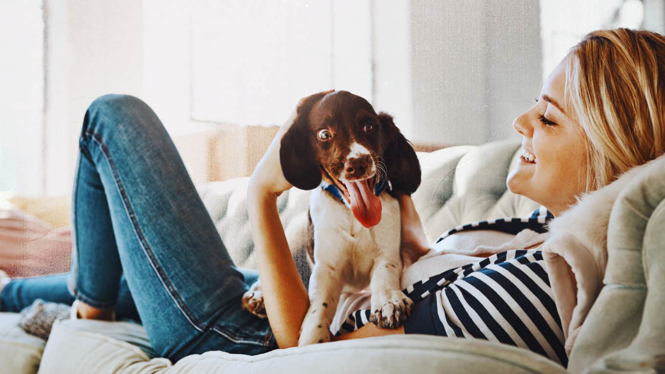 Woman spending time with her puppy