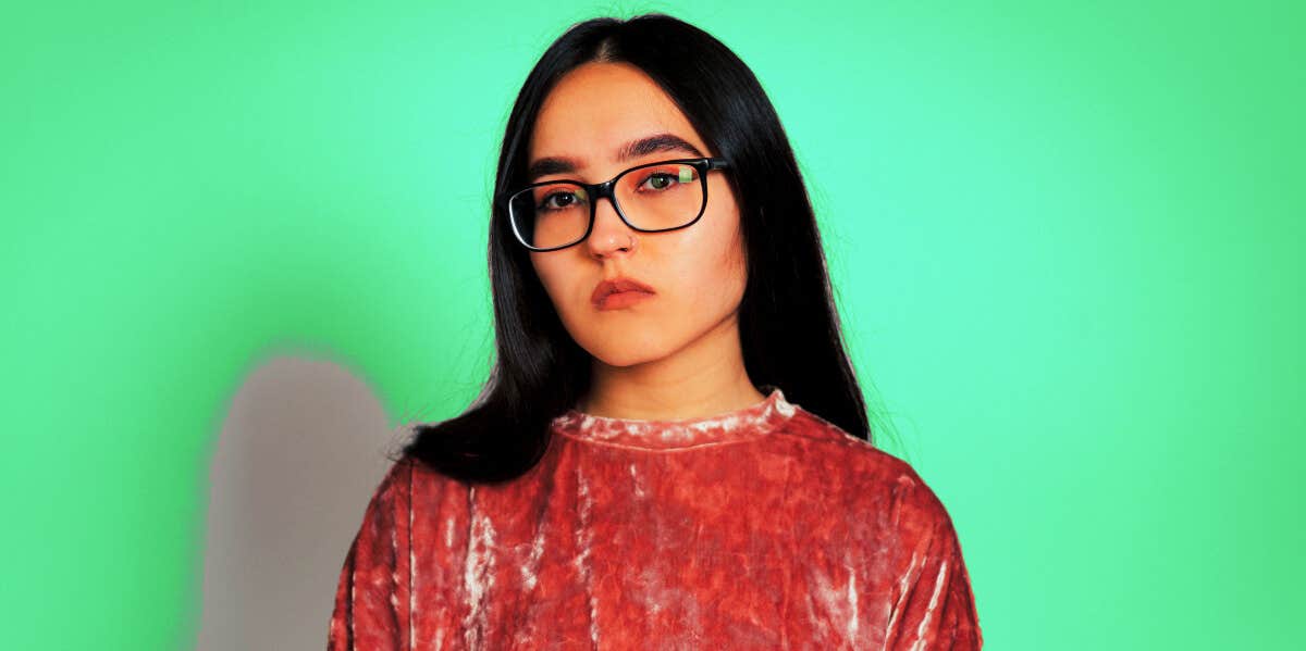 13 Signs You Have A Self-Help Addiction woman with glasses