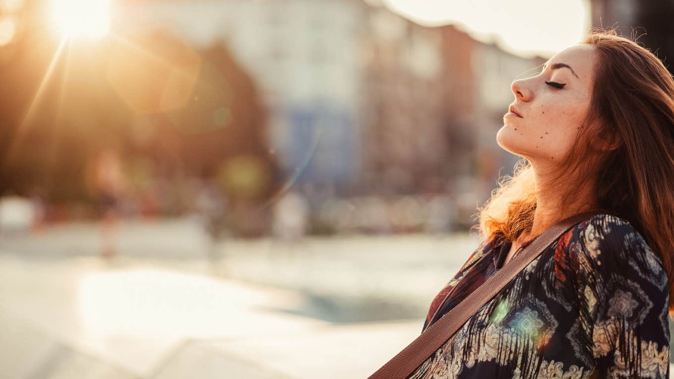 7 Tiny Ways To Drastically Change Your Relationship With Life Woman relaxing outside
