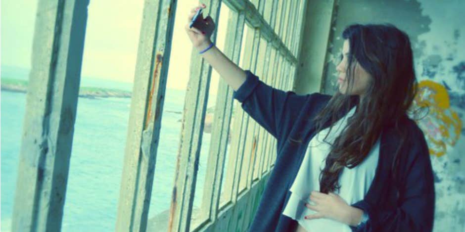 girl taking selfie girl taking selfie