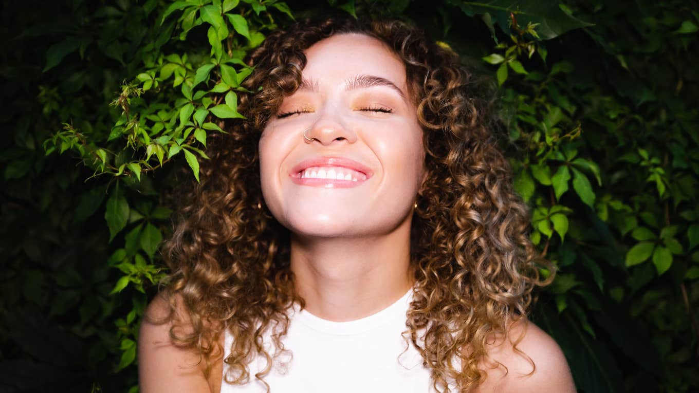 woman smiling in nature