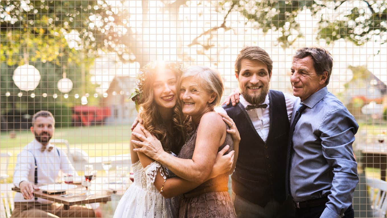 Newly weds with mother and father of the bride