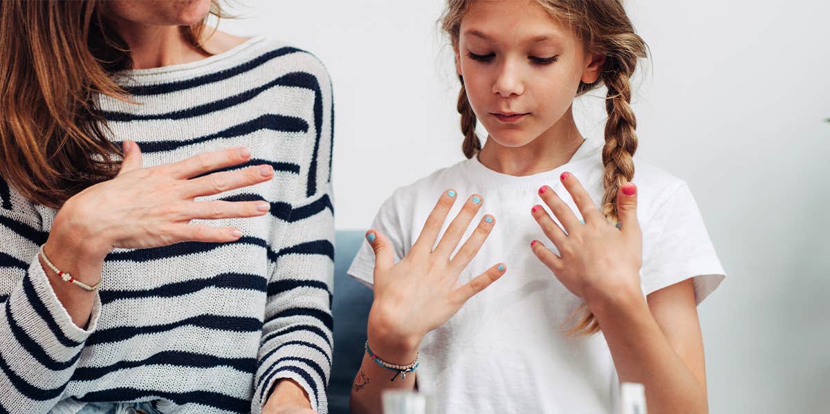 mom and daughter with nail polish on