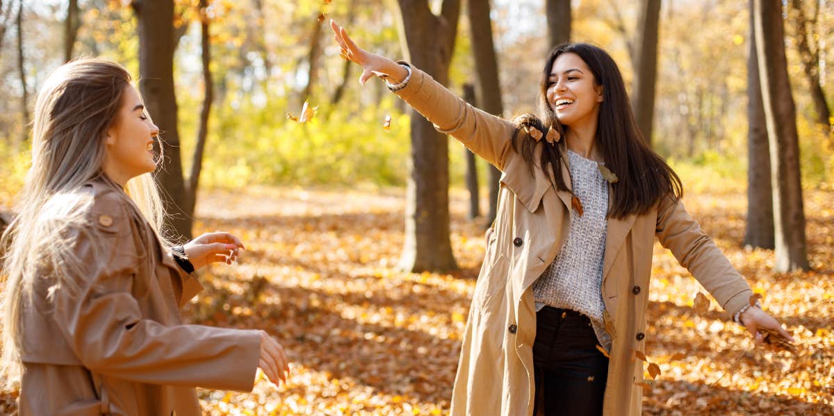 friends throwing leaves