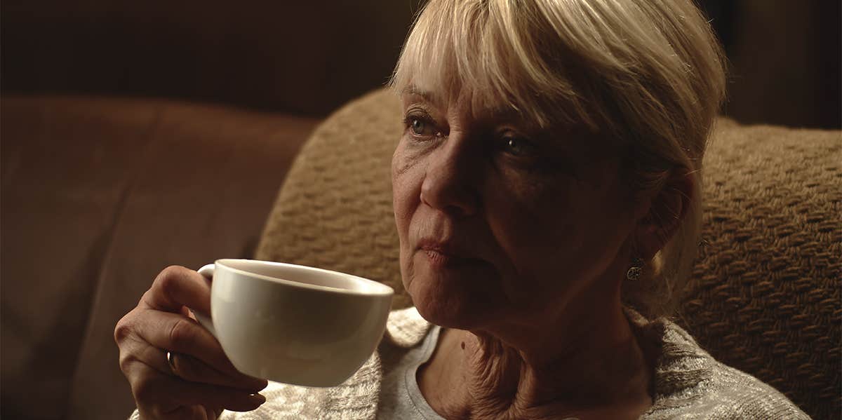 elderly woman drinking tea