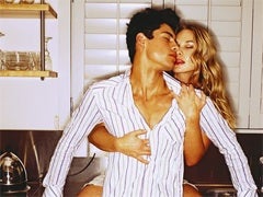 Do Men Prefer A Pretty Face Or A Curvy Bod? attractive couple making out