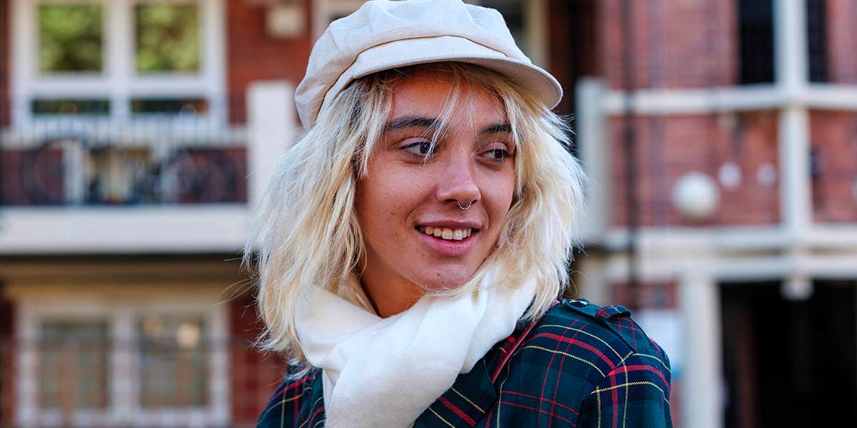 smiling girl in hat