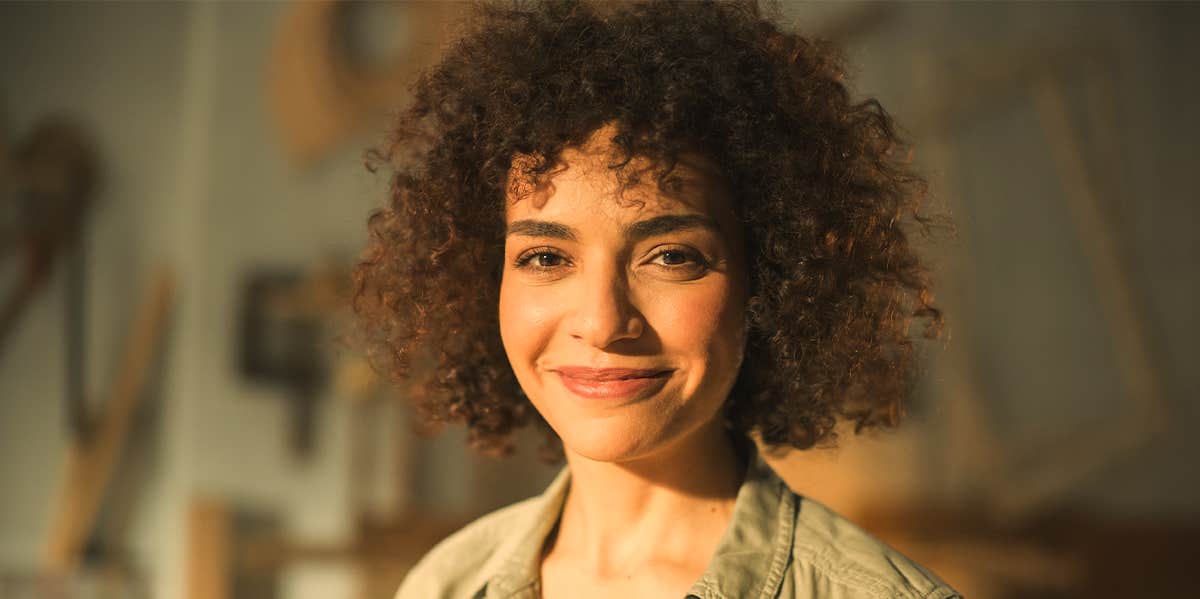 7 Shameless Rules That Have Drastically Bettered My Life Smiling woman