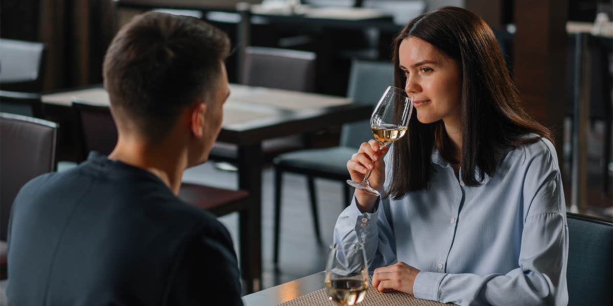 man and woman on dinner date