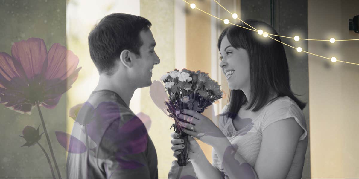 Man giving his girlfriend flowers