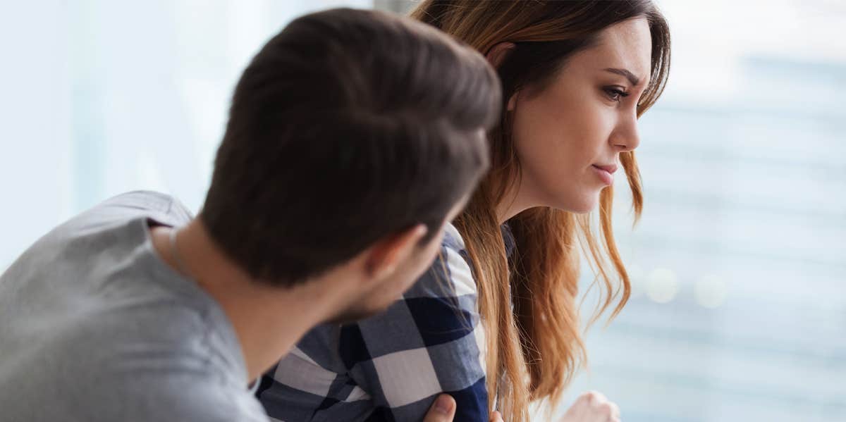 unhappy couple talking