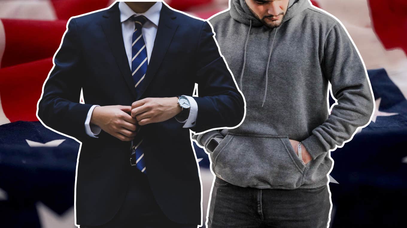 man wearing suit next to man wearing hoodie