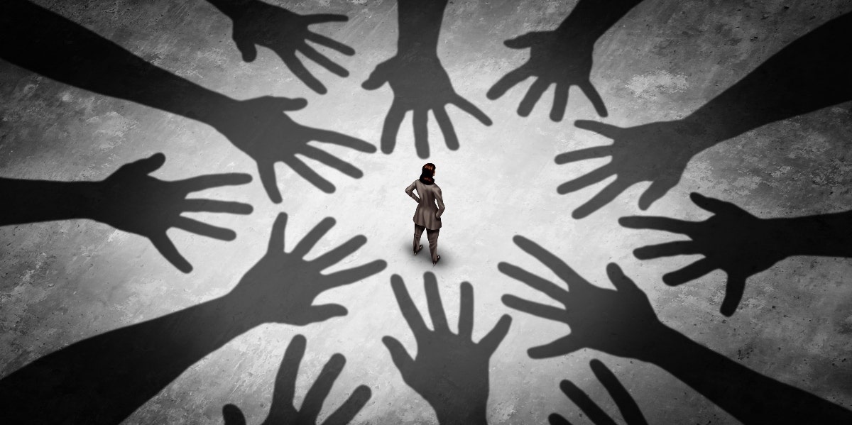 adhd and social anxiety woman standing alone with hands reaching for her