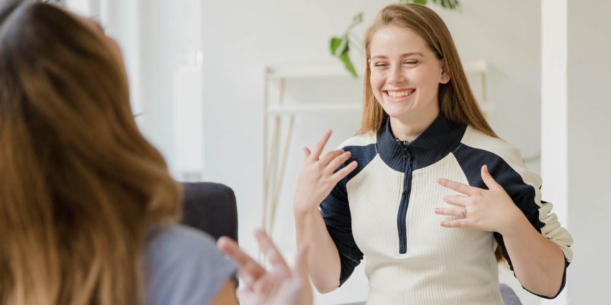 Women using sign language