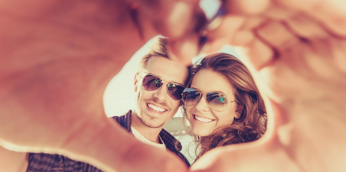 couple with heart hands falling in love 