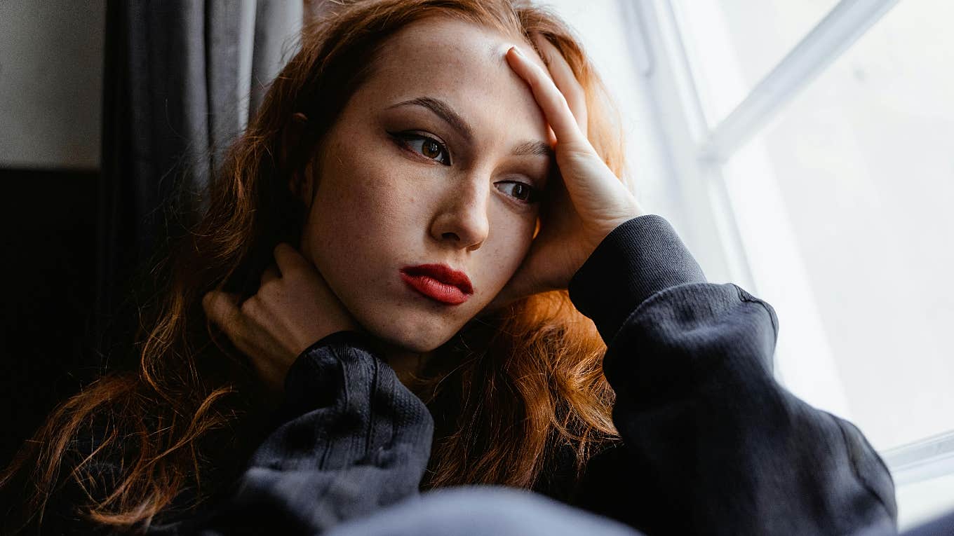 12 Signs Of Emotional Damage & How It Affects Relationships distraught woman