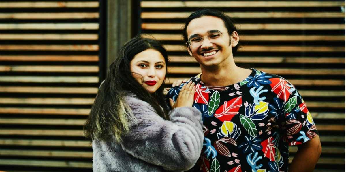 21 Signs He Has Strong Feelings For You smiling couple