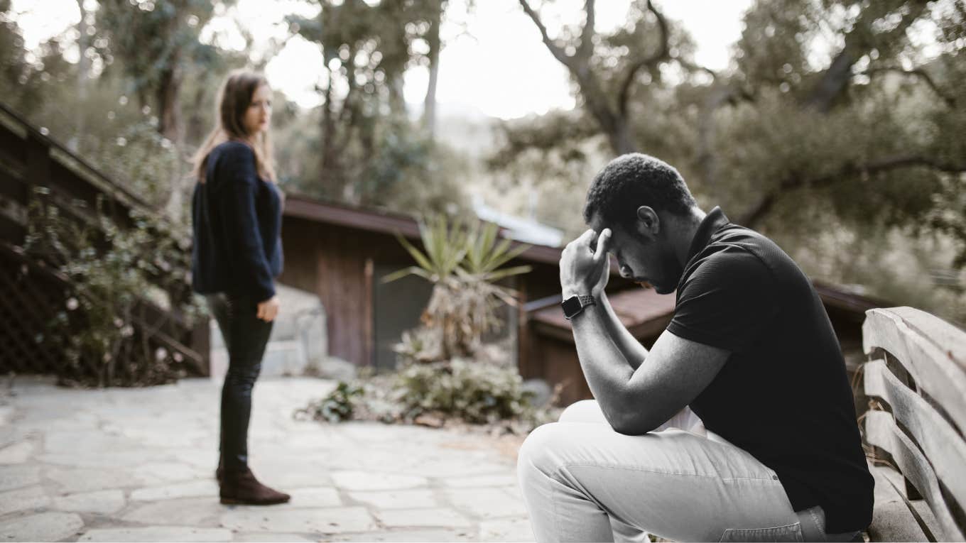 woman walking away from partner