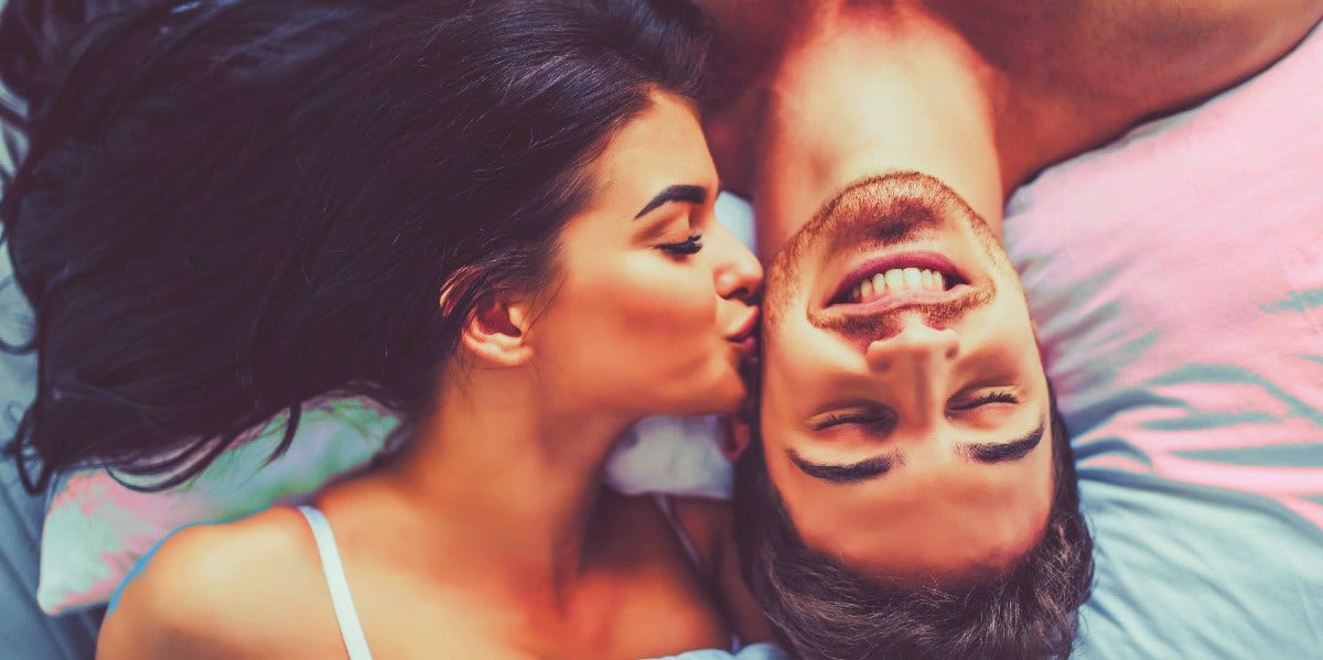 10 Signs He's Satisfied In Bed & Enjoys Having Sex With You woman with man who is satisfied in bed