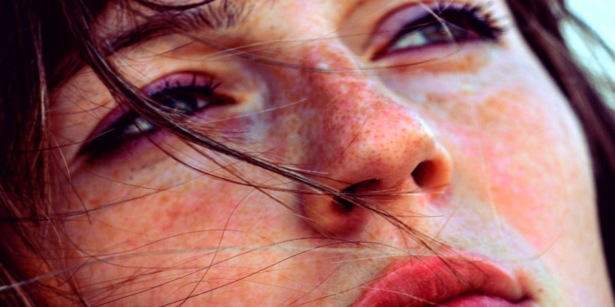 9 Signs Of Narcissistic Abuse, Explained By A Therapist close up sad woman's face