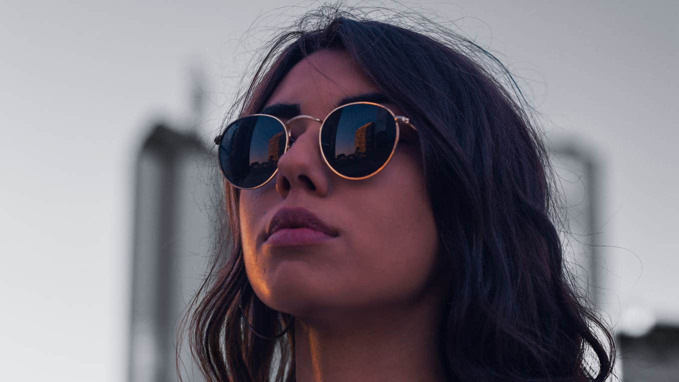 8 Signs You're An Adult Bully And How To Stop Your Behavior woman in sunglasses