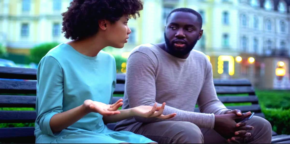 man and woman arguing on a bench