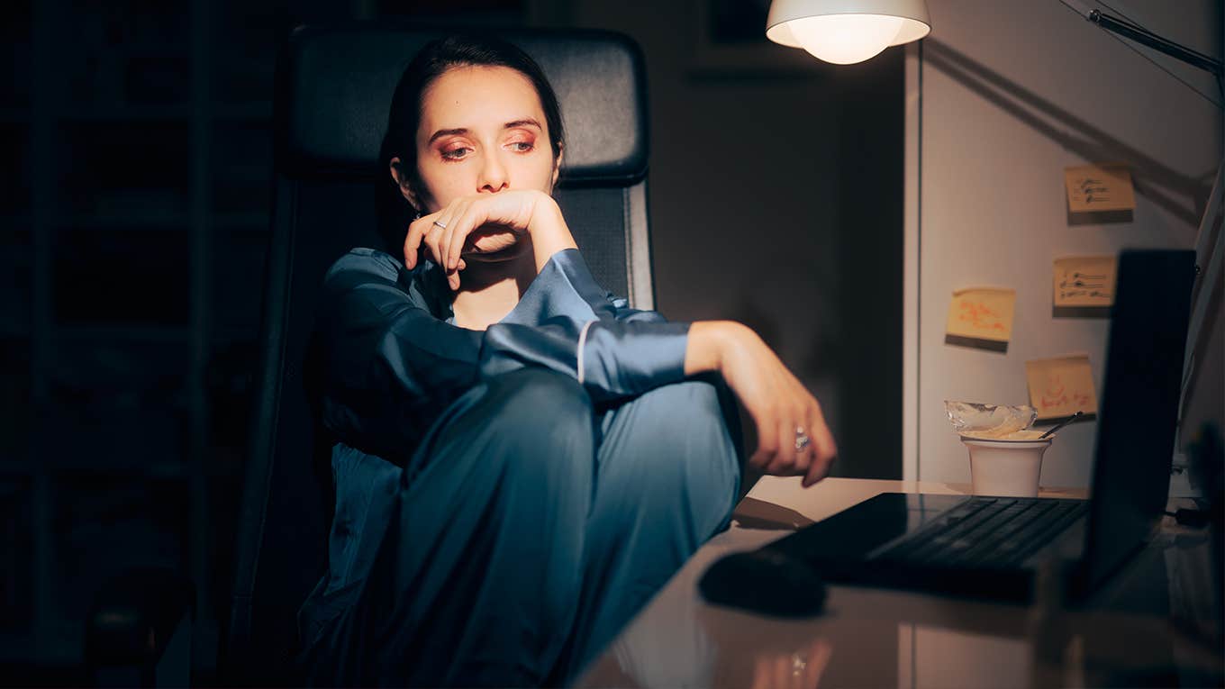 Signs You’ve Outgrown Someone Who Seemed Important In Your Life sad woman sitting in the dark
