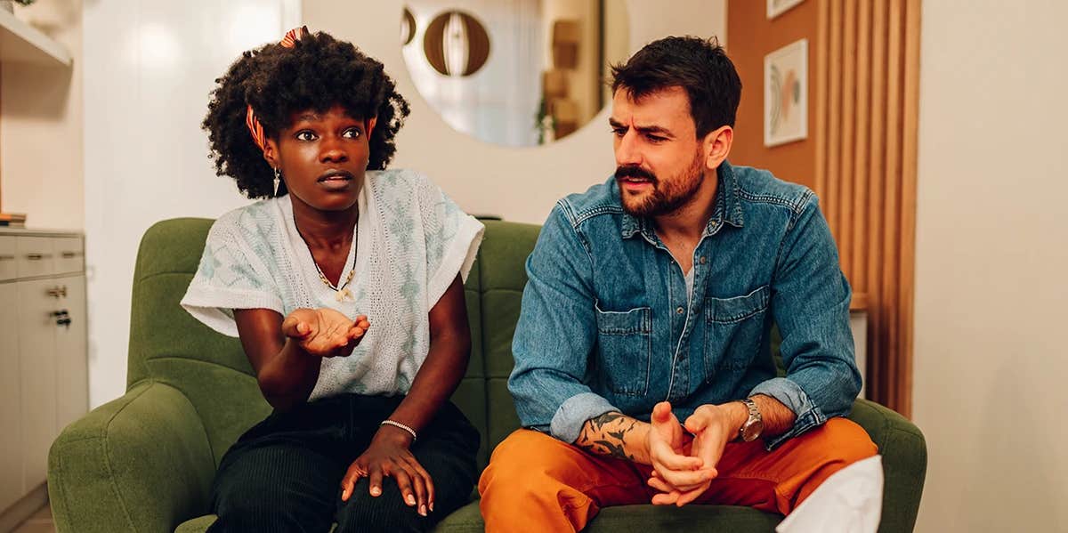 Signs Of Manipulation couple sitting next to each other looking confused