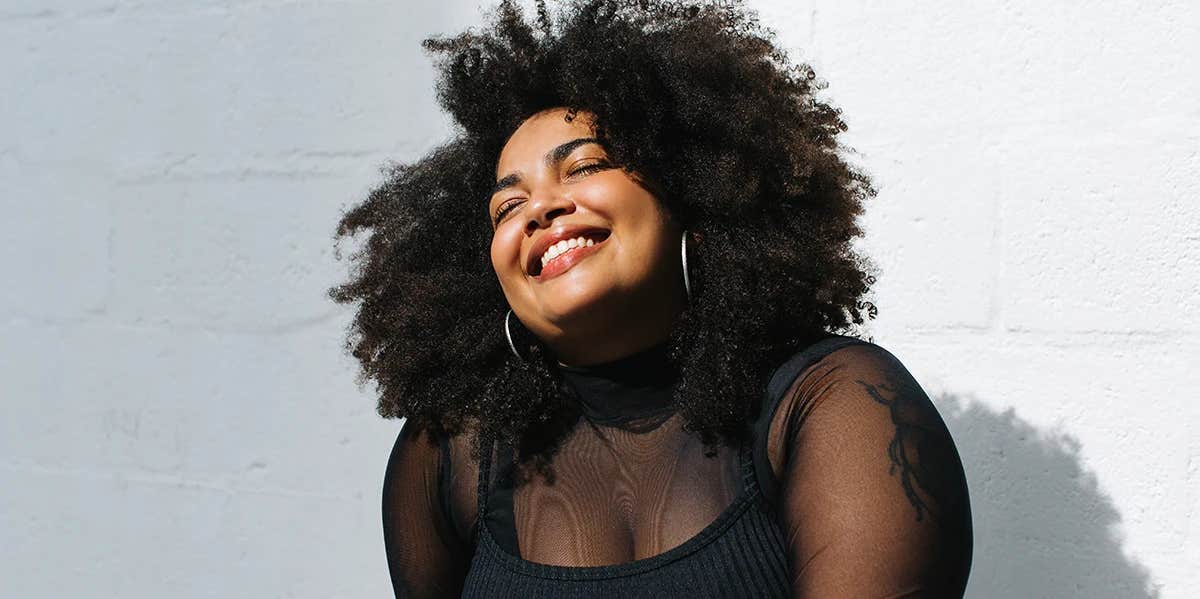 10 Signs You Have A Big Heart smiling happy woman
