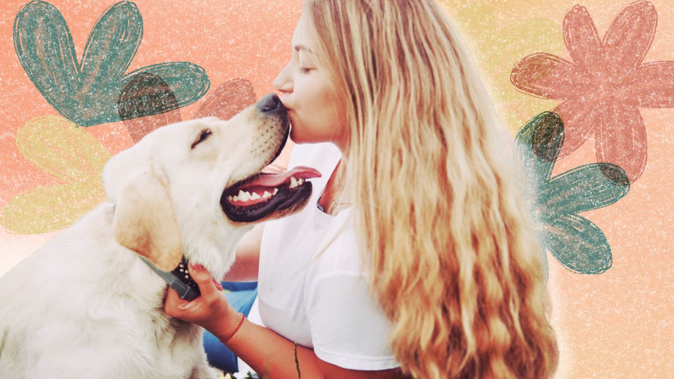 5 Tiny Signs You Hold An Incredibly High Vibration Woman loving on her dog