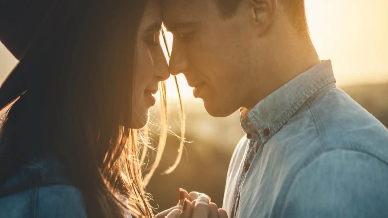 11 Little Signs You Mean Something To Him couple about to kiss