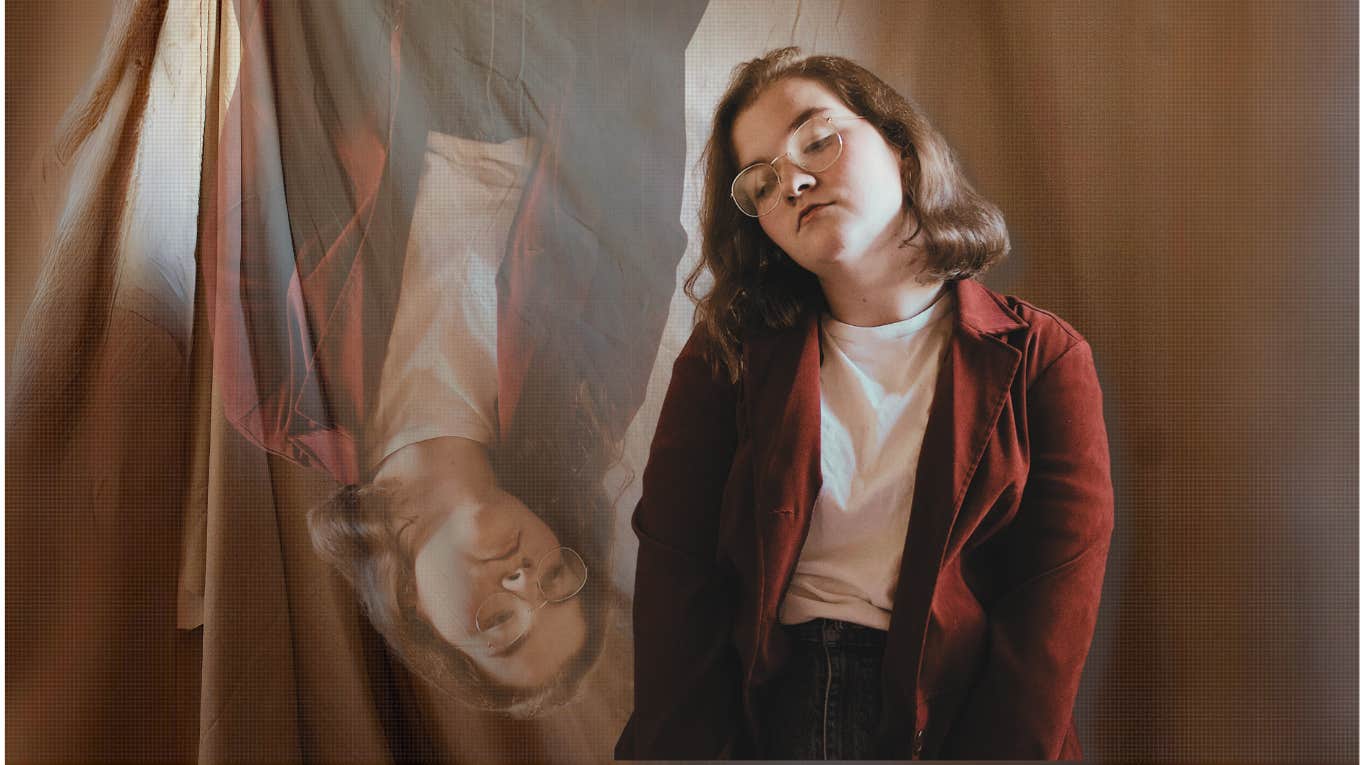5 Do-Not-Ignore Signs Your Depression Is Getting Serious sad woman in a red sweater