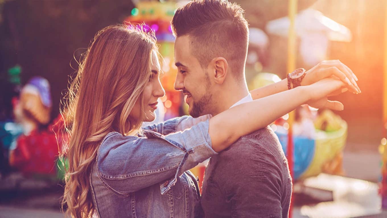 15 Beautiful Signs Your Soulmate Is Thinking Of You couple in an embrace
