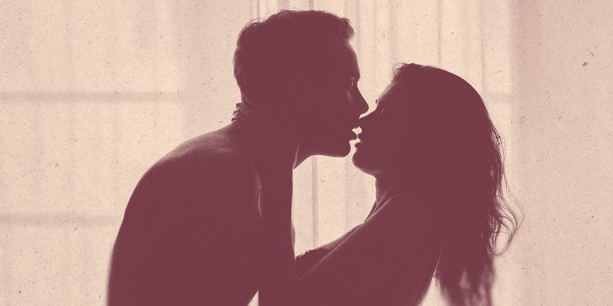 7 Signs You're Dangerously Addicted To Love woman and man kissing in silhouette