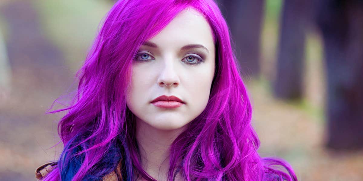 woman with vibrant purple hair