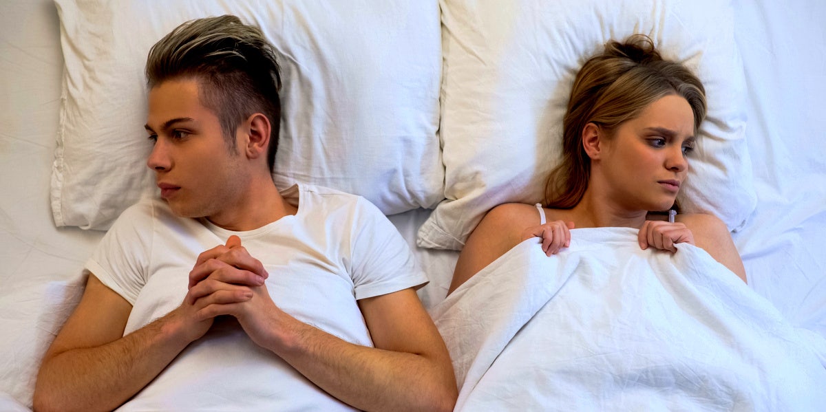 man and woman who think they're bad in bed