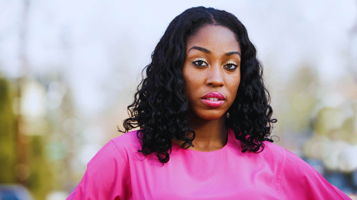 10 Signs You're Emotionally Numb From Childhood Trauma woman outside